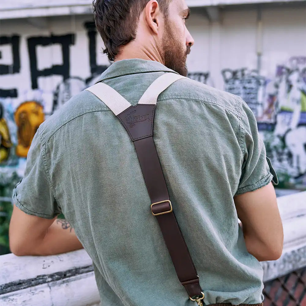 Man leaning against wall wearing Wiseguy Original Suspenders